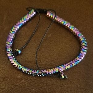 The Hand Crafted Rainbow Hematite Bracelet Adjustable Black Cord